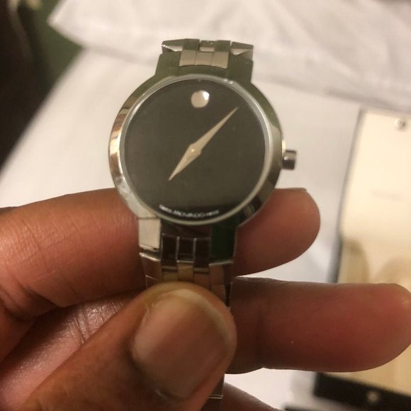 Authentic MOVADO sapphire Crystal in Silver and Black face